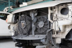 Car repair and maintenance services. Cooling system repair. Car radiator repair system at repair workshop